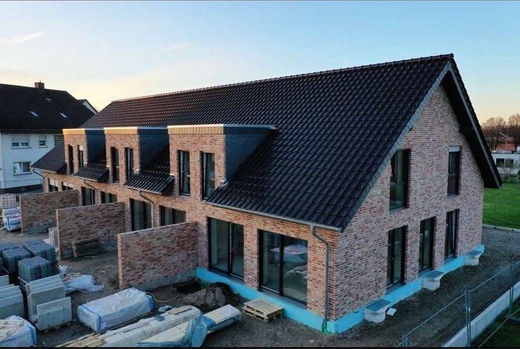 KfW-55-Reihenendhaus mit EBK, Vollkeller, 2 Stellplätze ab 1025