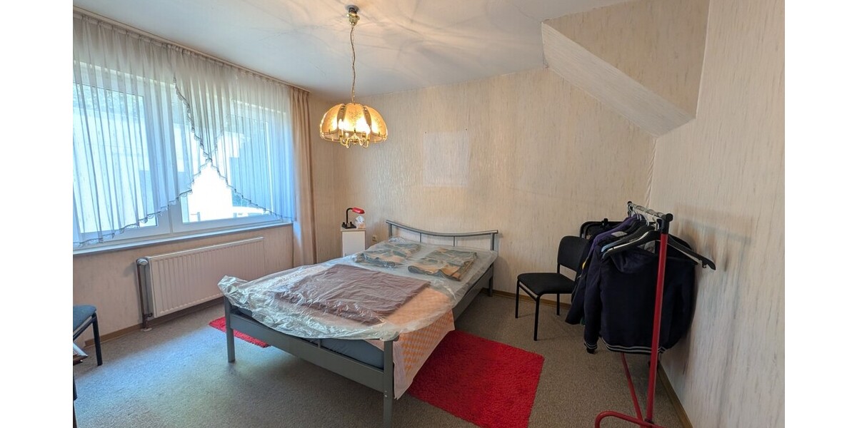 Großes Grundstück in Hüllhorst: Einfamilienhaus mit Potenzial zur Neugestaltung - Einfamilienhaus Hüllhorst | Angebot:26948470