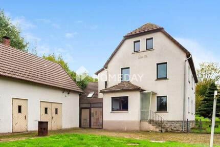 Charmantes Zweifamilienhaus mit großem Grundstück in ruhiger Lage 7 zimmer