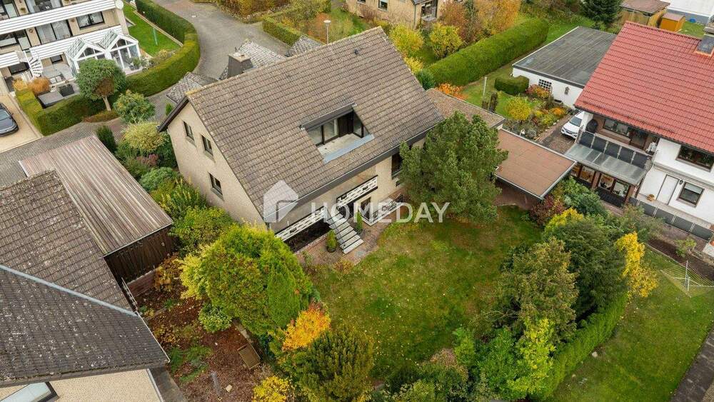 Familienfreundliches Einfamilienhaus mit großem Garten, Kamin und Doppelgarage 7 zimmer