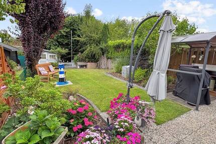 Wohlfühlhaus mit Gartenidylle - vermietetes Reihenmittelhaus in bester Lage 4 zimmer