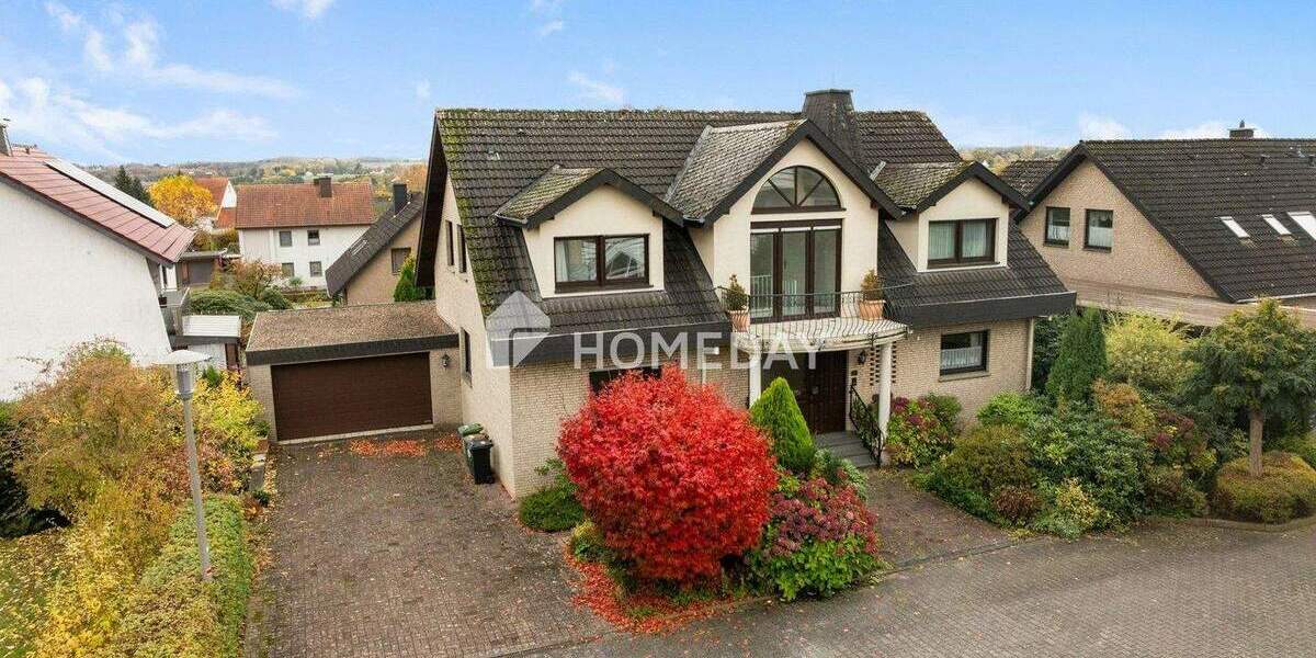 Familienfreundliches Einfamilienhaus mit großem Garten, Kamin und Doppelgarage 7 zimmer