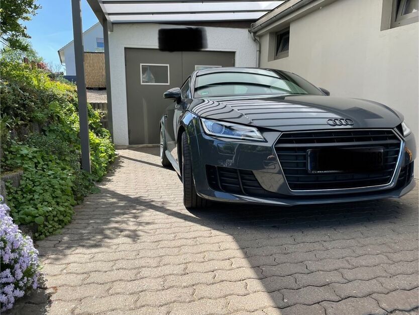 TT