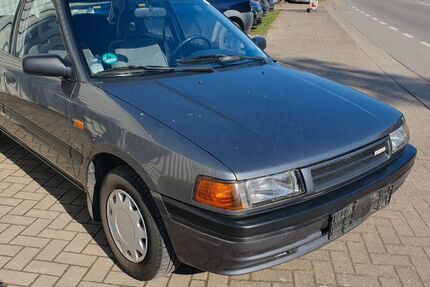 Mazda 323 184.000 km 2.799 &euro; Melle 49324