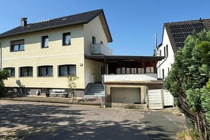 Zeitloses Zweifamilienhaus aus massiver Bauweise in Bad Salzufeln zimmer