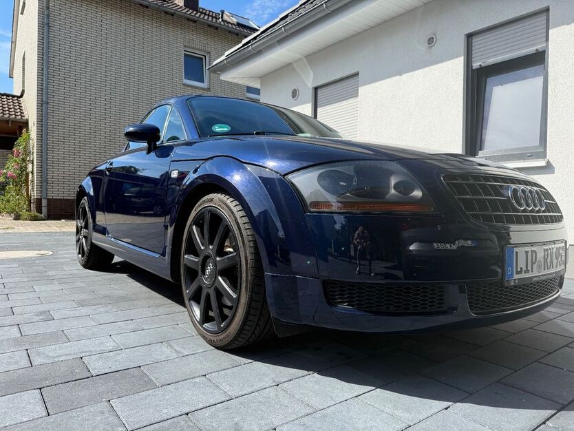 TT