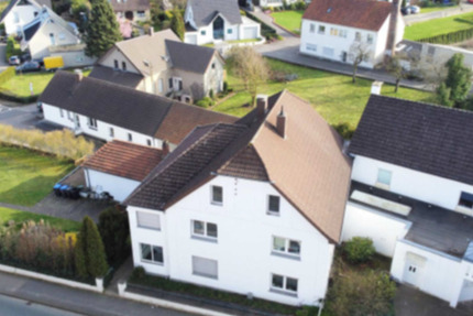 Kapitalanlage + Baugrundstück: 5-Familienhaus + Werkstatt & Büro