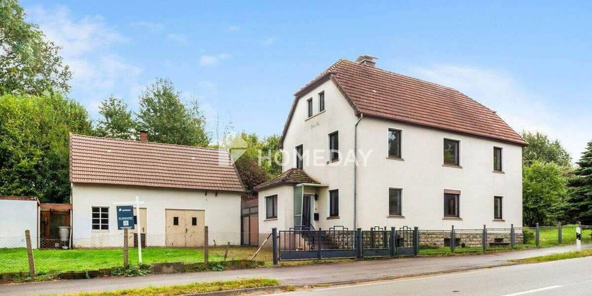 Charmantes Zweifamilienhaus mit großem Grundstück in ruhiger Lage 7 zimmer