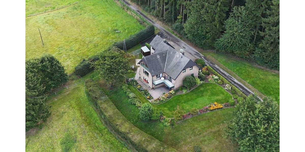 Großzügiges Einfamilienhaus trifft auf ruhige Waldrandlage in Hilter 5 zimmer