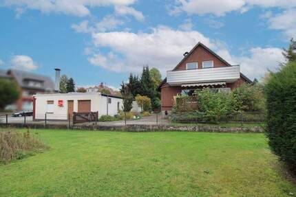 Wohnen & Vermieten in Hiddenhausen - gepflegtes Wohnhaus mit vermietetem Dorfgrill zimmer