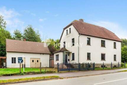 Charmantes Zweifamilienhaus mit großem Grundstück in ruhiger Lage 7 zimmer