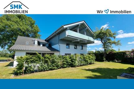 Moderne Wohnung mit dem Wohngefühl einer Doppelhaushälfte – Erstbezug nach Sanierung!