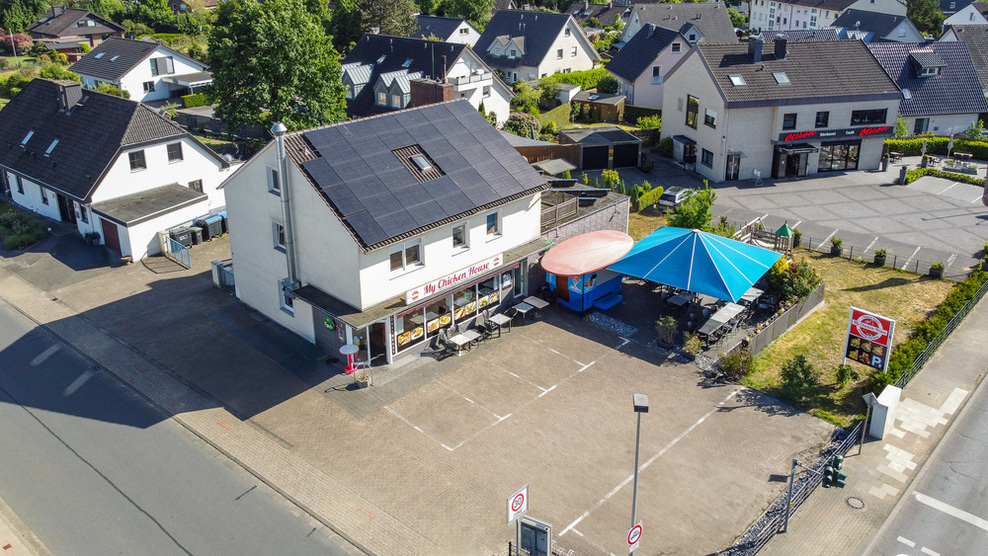 Solides Renditeobjekt – Wohn- und Geschäftshaus mit Anbaupotenzial und Photovoltaik zimmer