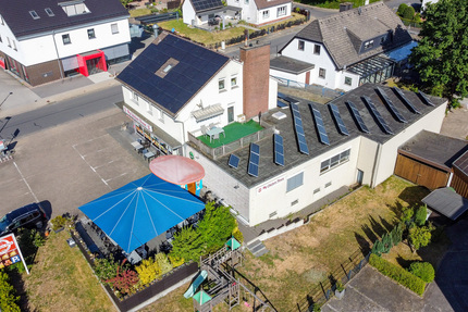 Solides Renditeobjekt – Wohn- und Geschäftshaus mit Anbaupotenzial und Photovoltaik zimmer