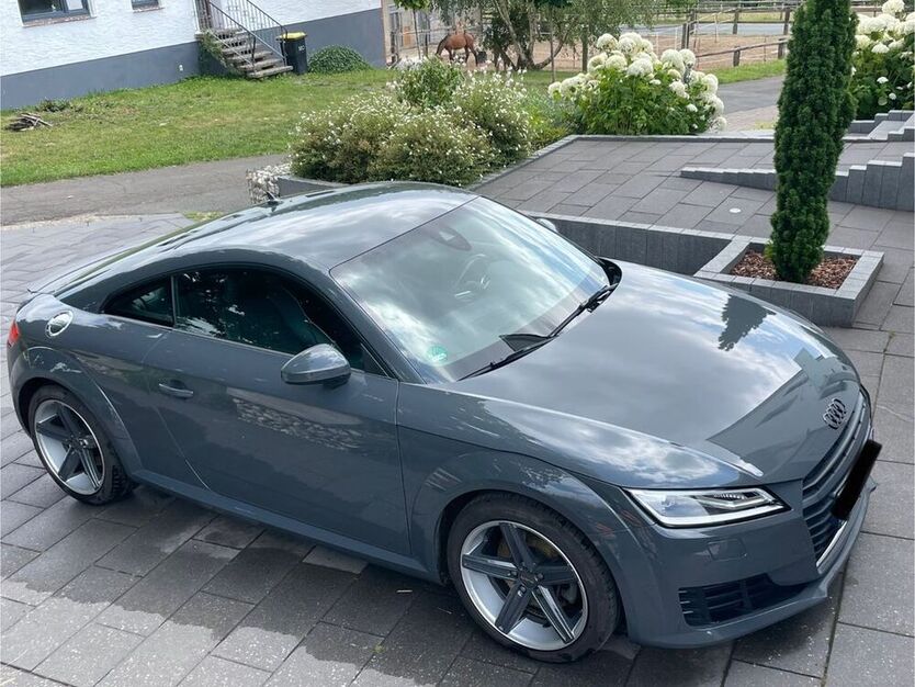TT