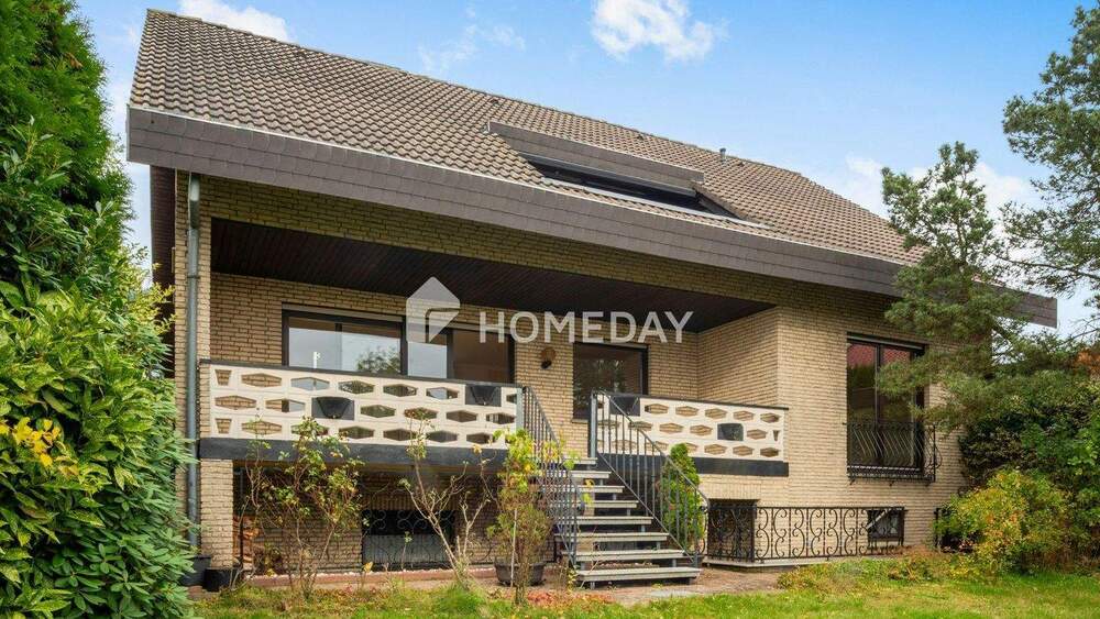 Familienfreundliches Einfamilienhaus mit großem Garten, Kamin und Doppelgarage 7 zimmer