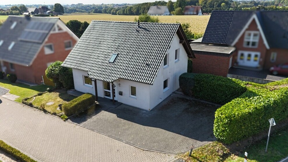 Familiengerechtes Einfamilienhaus mit pflegeleichtem Garten und 3 Stellplätzen 5 zimmer