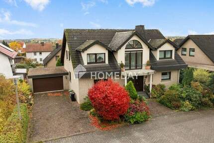 Familienfreundliches Einfamilienhaus mit großem Garten, Kamin und Doppelgarage 7 zimmer