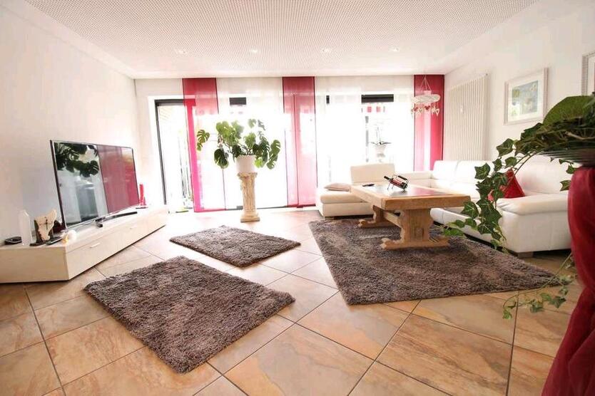 Großzügige 1.OG-Wohnung mit Westbalkon und Gartenanteil in BI